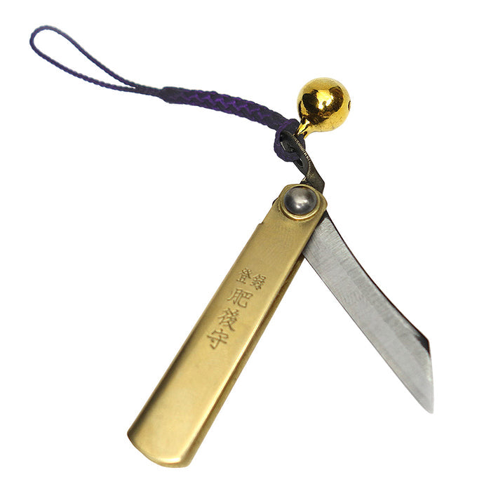 Brass bell and lanyard accessory attached to Higonokami XS Japanese pocket knife