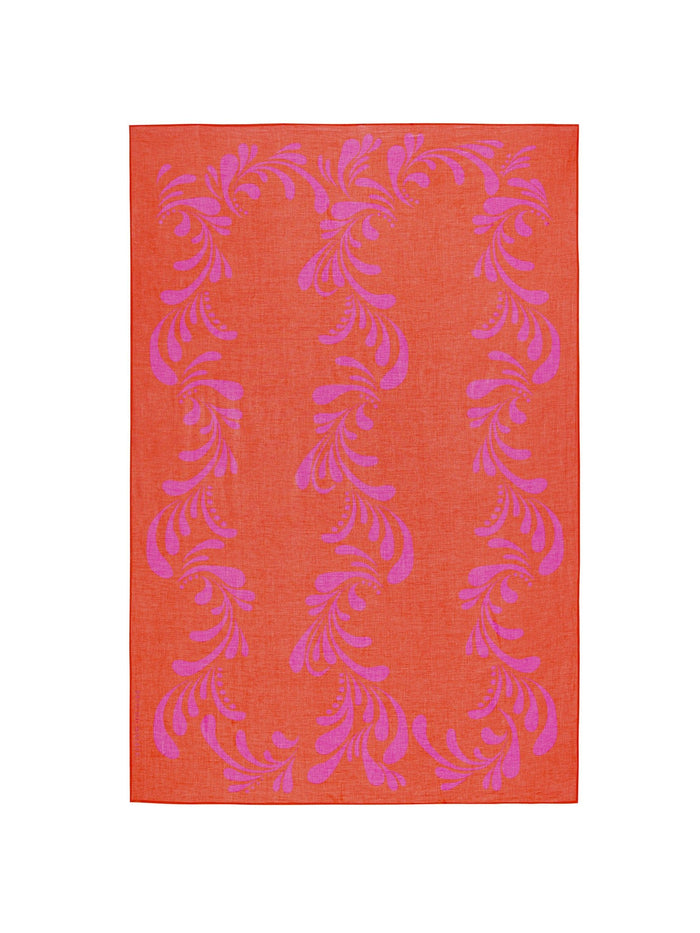 Orange and pink tropical-print pareo wrap, shown flat on a white background.