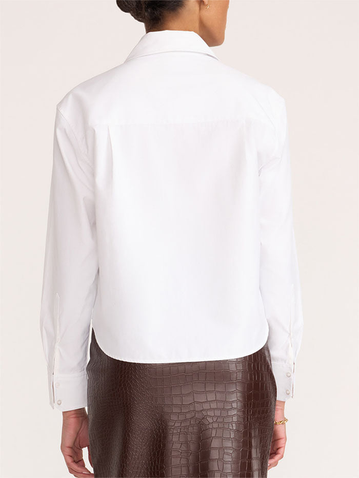 Everyday cropped button-up shirt in salt white, back view styled with a brown croco-embossed skirt