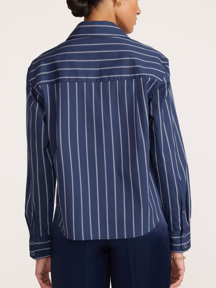 Everyday cropped shirt in Hartford stripe, a back view of the striped button-up shirt paired with navy pants.