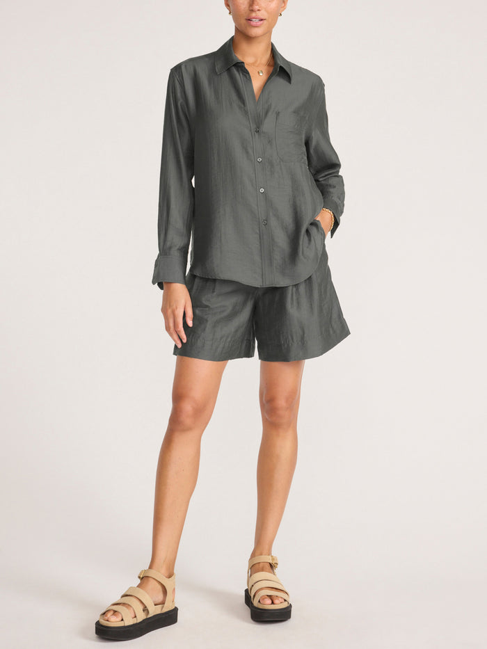 Everyday voile shirt in brownstone, a front view of the button-up shirt paired with matching shorts and tan platform sandals.