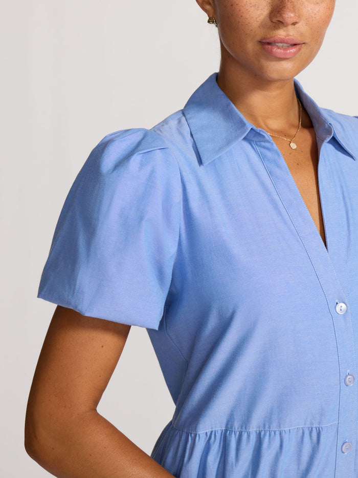 Shirtdress in chambray blue, close-up of collar and puff sleeve detail