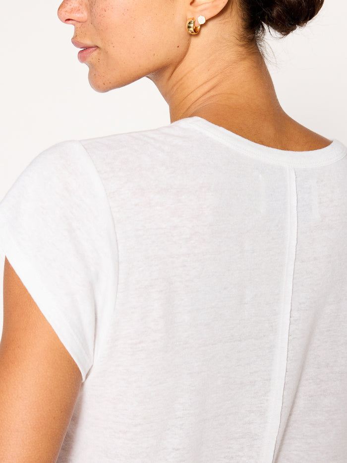 Koda tee in salt white, a close-up back view of the crew-neck t-shirt fabric.