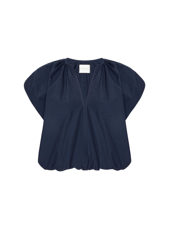 Navy blue V-neck top with voluminous gathered sleeves