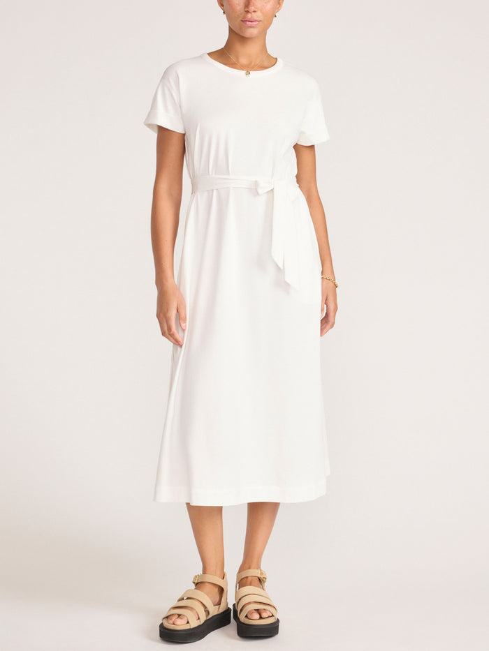 Front view of the ivory Marah t-shirt midi dress styled with a self-tie belt.