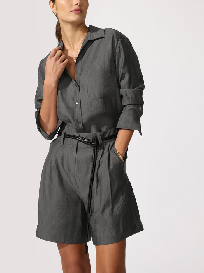 Everyday voile shirt in brownstone, a three-quarter front view of the button-up shirt belted over matching Maris voile shorts.