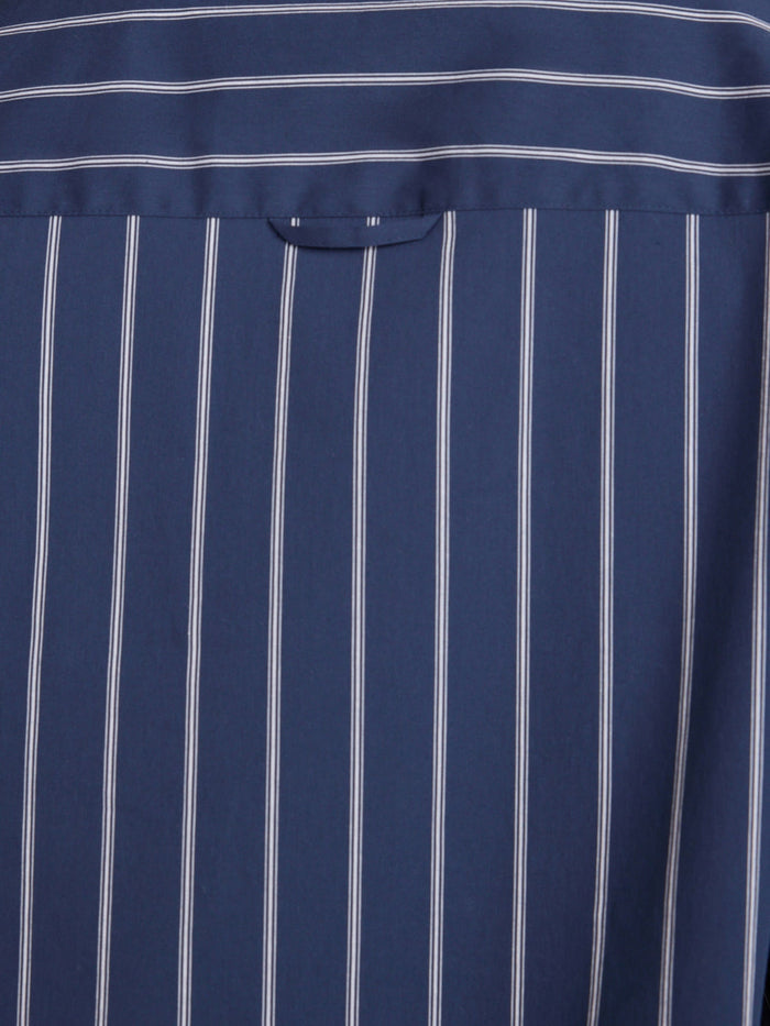 Pia shirt in Hartford stripe, fabric close-up of navy blue pinstripe cotton with striped yoke detail
